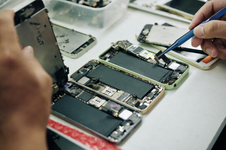 repairman fixing smartphones 2025 01 29 07 50 46 utc